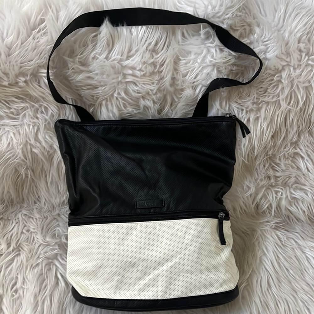 Vans black and white adjustable tote backpack.